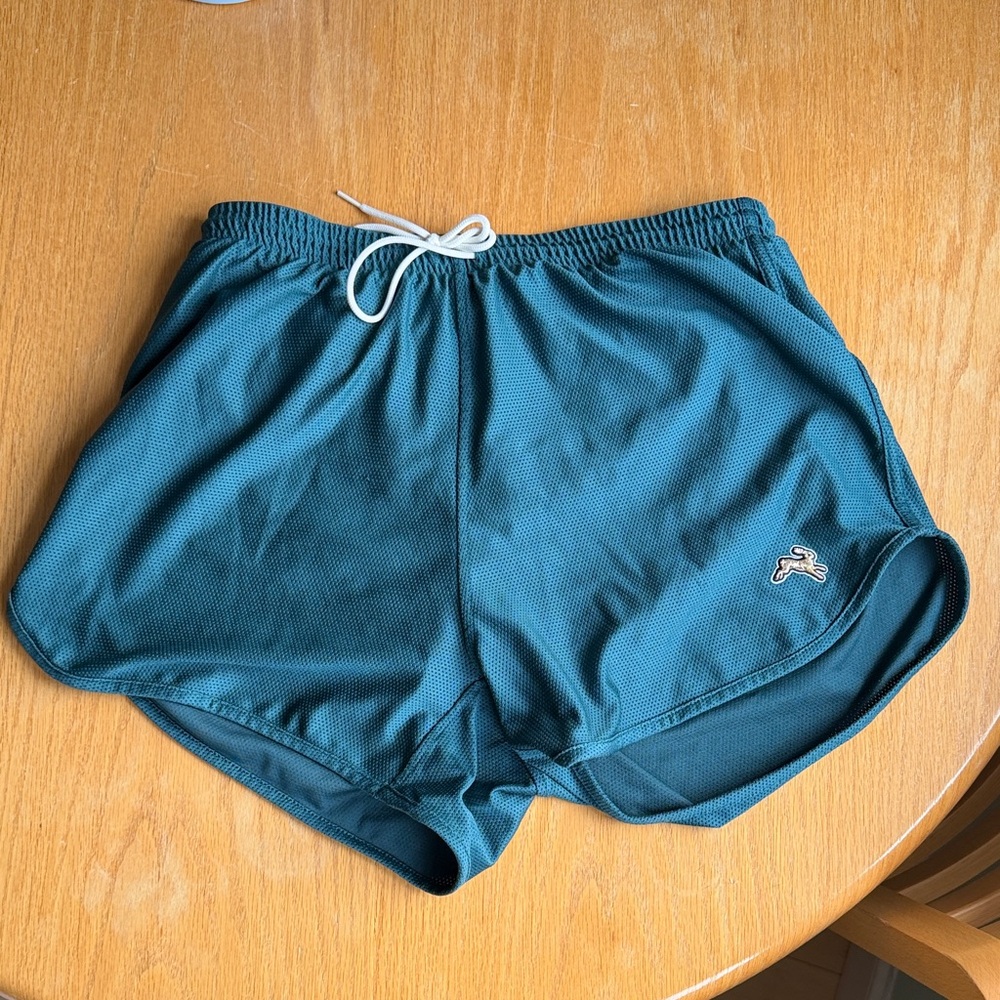Van Cortlandt Grand Shorts
- Teal Mesh Running Shorts